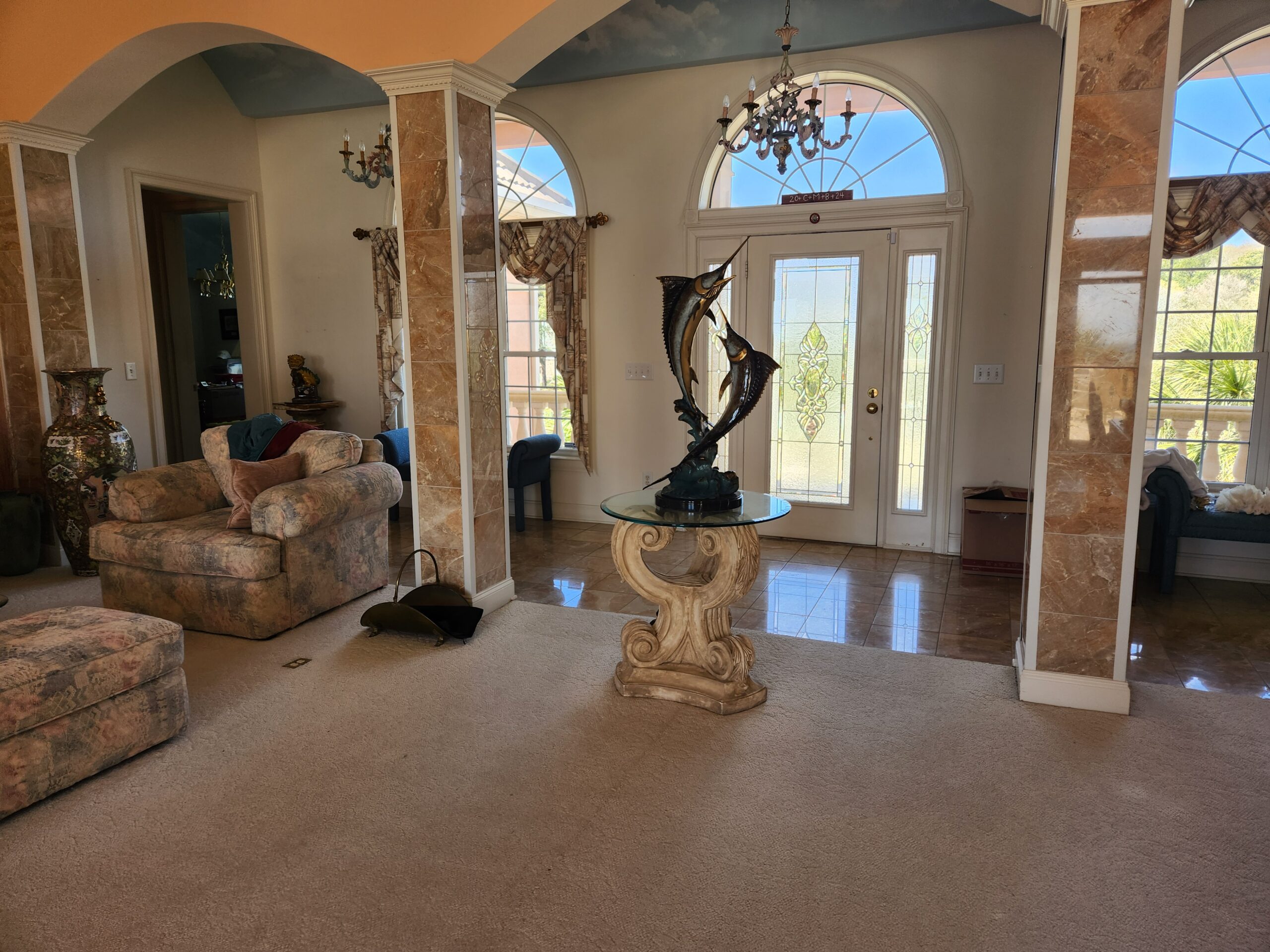 Interior view of luxury Dunes Club estate auction contents